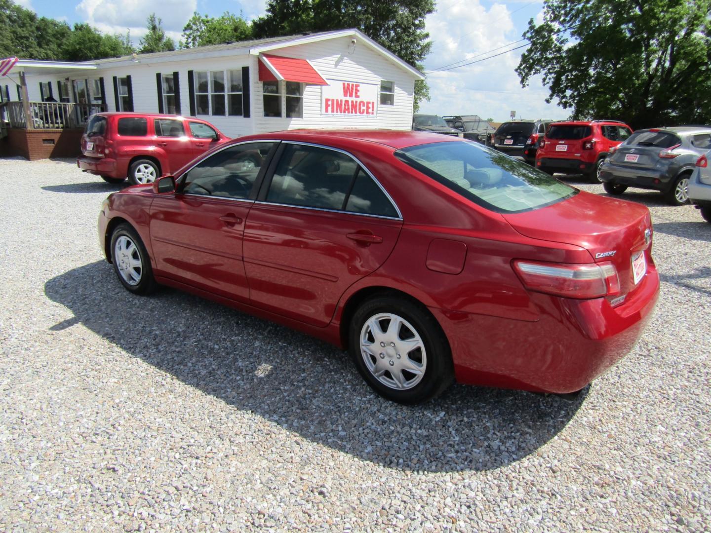 2007 Red /Tan Toyota Camry (4T1BK46K97U) with an 4 CYL engine, Automatic transmission, located at 15016 S Hwy 231, Midland City, AL, 36350, (334) 983-3001, 31.306210, -85.495277 - Photo#5
